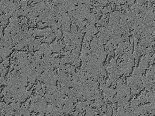 Detalhe de textura Grafine cinza aplicada em parede